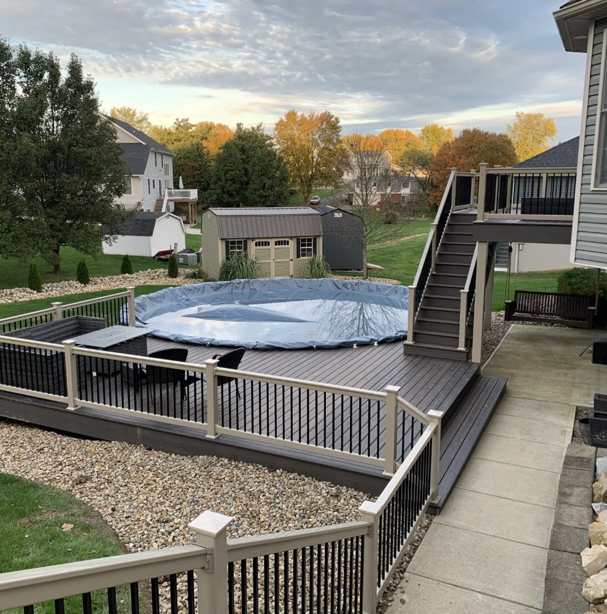 pool deck with railing and stair install